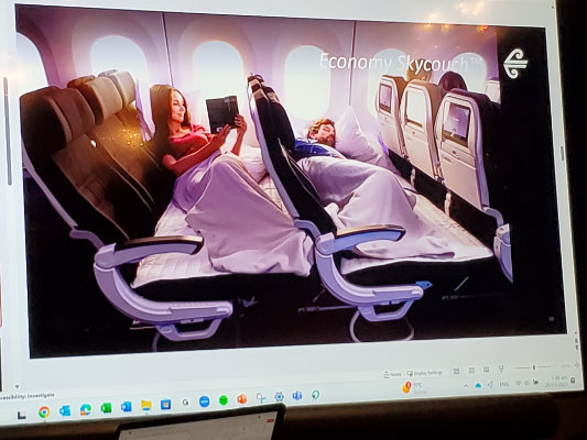 Sleeping on NZ Air.jpg resized